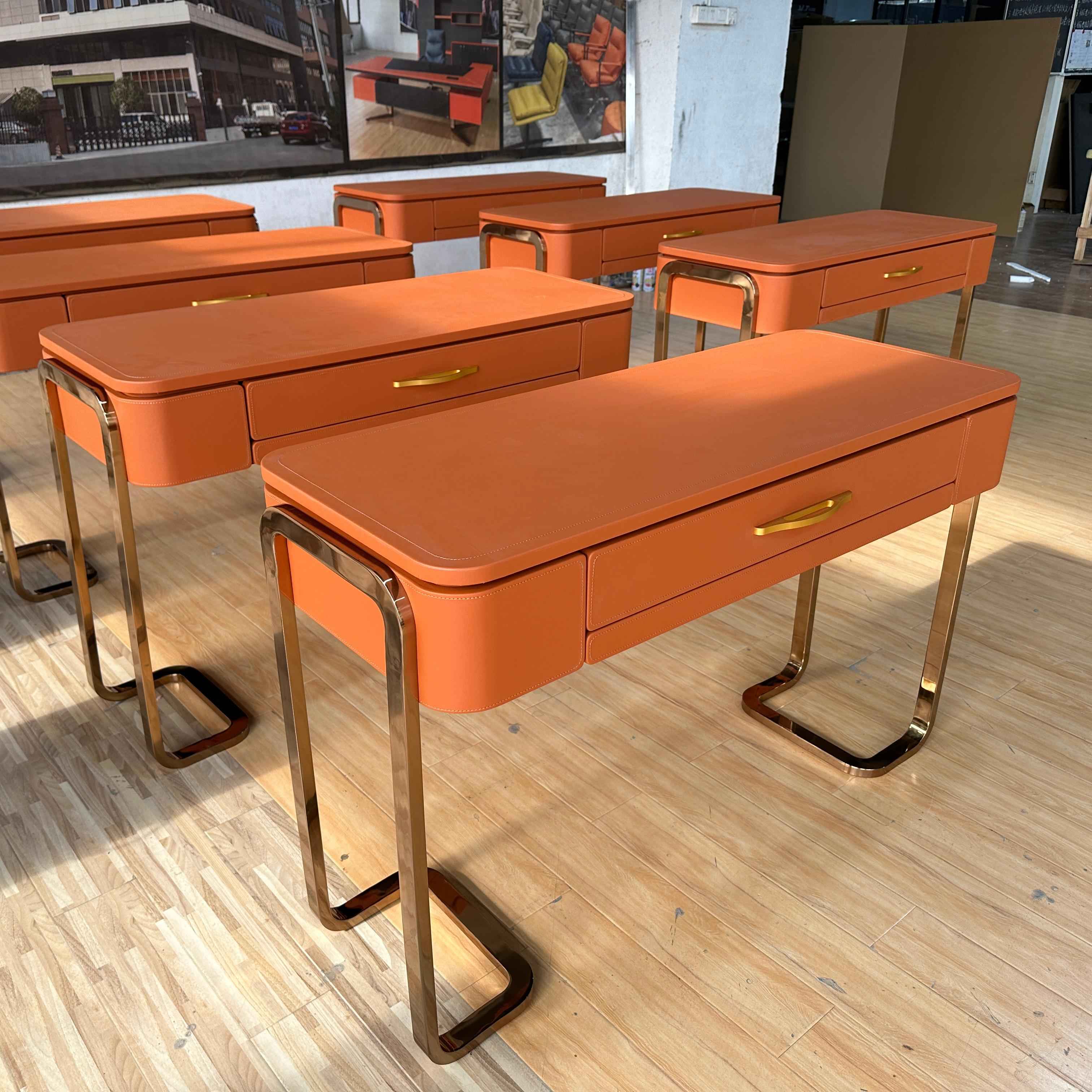 Custom Case Share: Exclusive Desk with Orange Saddle Leather and Rose Gold Frame, Embodying Elegant Simplicity